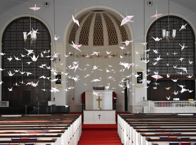 Paper doves suspended above sanctuary