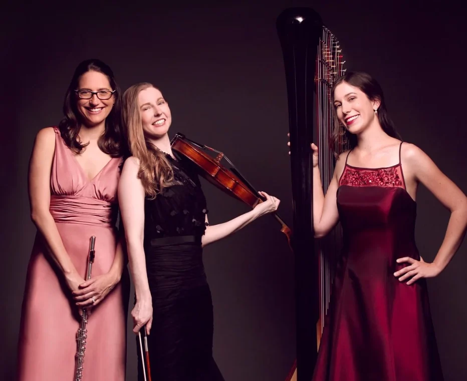 The 3 musicians in Trio Sirènes pose with their instruments