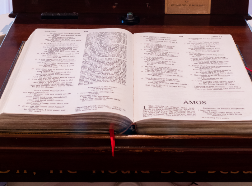 Bible open on pulpit